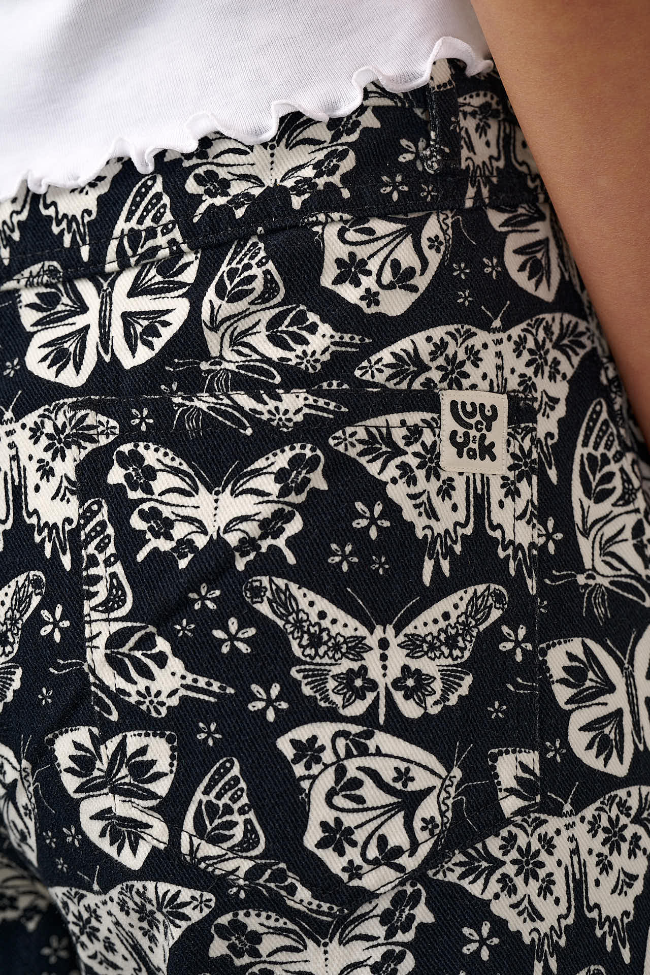 Carter - High Waisted Cotton Trousers in Black & White Butterfly Print - Image 3