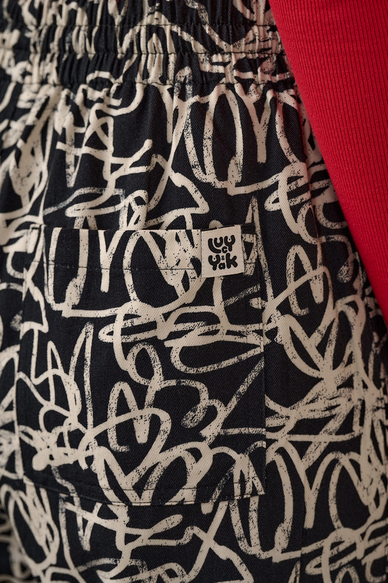 Chuck - Wide Leg Cotton Trousers in Black & White Graffiti Print - Image 6
