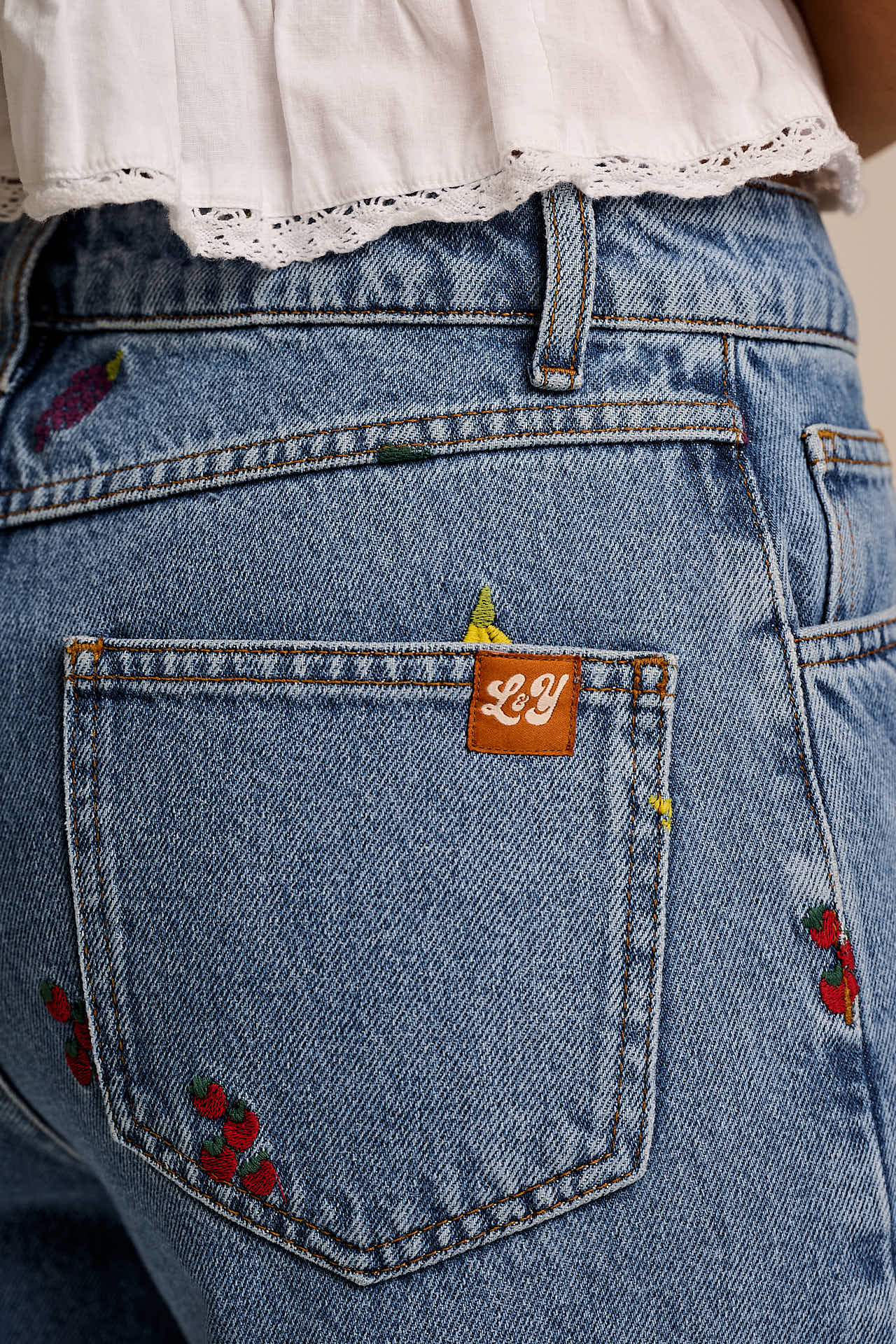 Drew - Cropped Straight Legged Cotton Trousers in Light Wash Veg Embroidery - Image 12