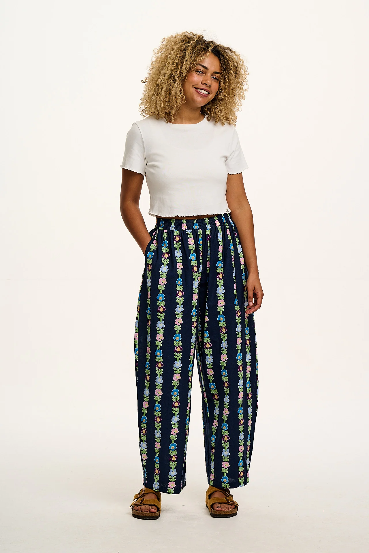Freddie - Barrel Leg Cotton & Linen Trousers in Navy Island Bloom Print - Image 10