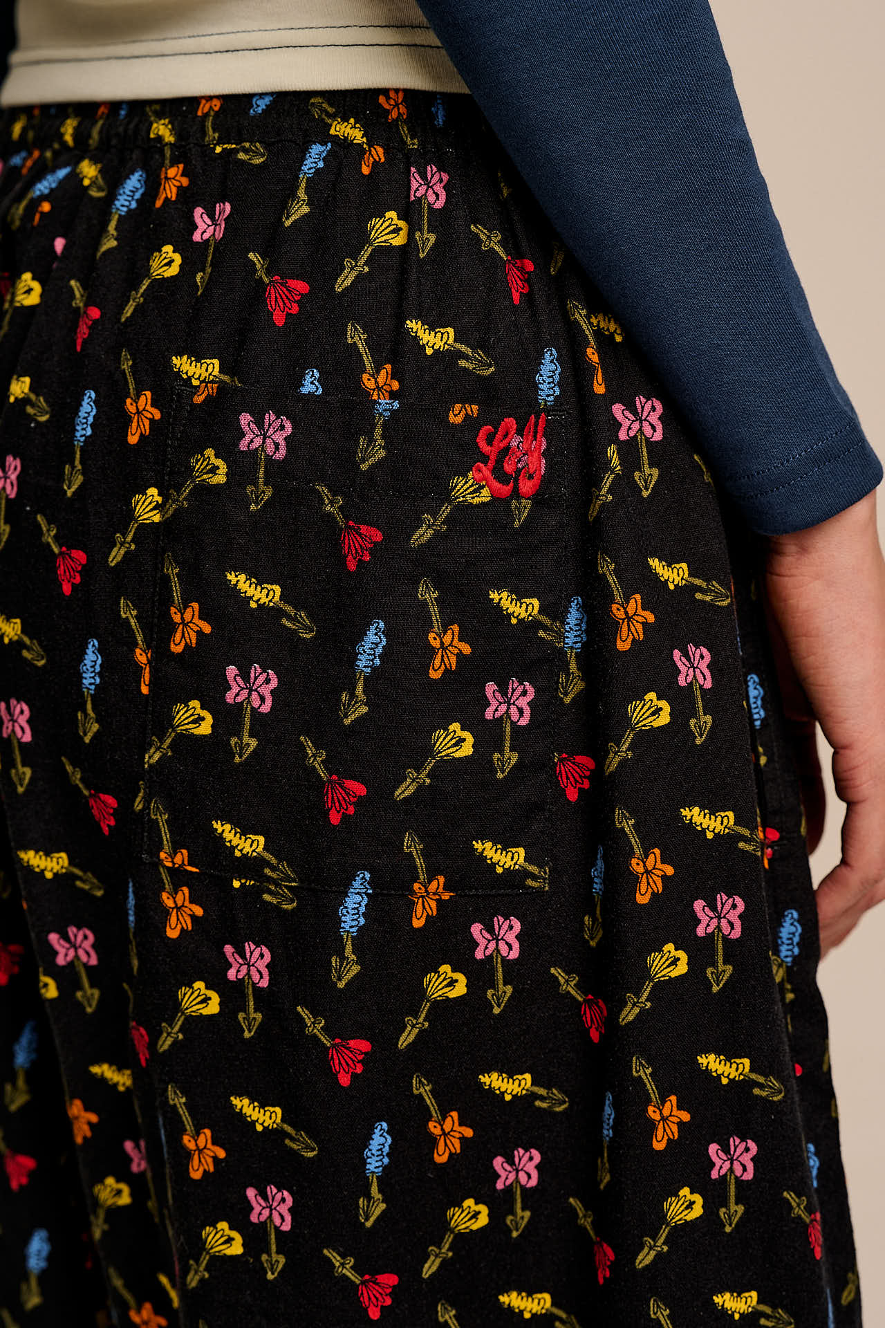 Renata - Cuffed Cotton Balloon Leg Trousers in Mini Tulips on Black - Image 3