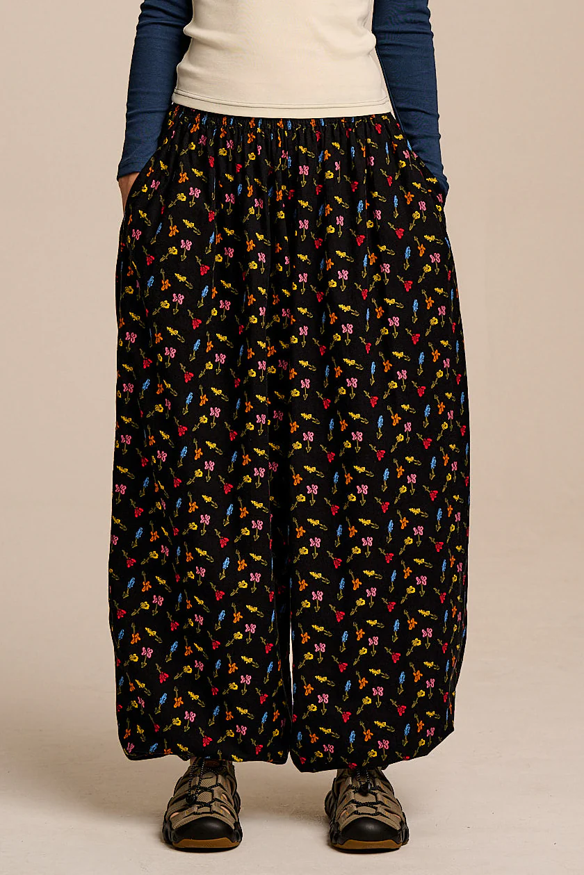 Renata - Cuffed Cotton Balloon Leg Trousers in Mini Tulips on Black - Image 5