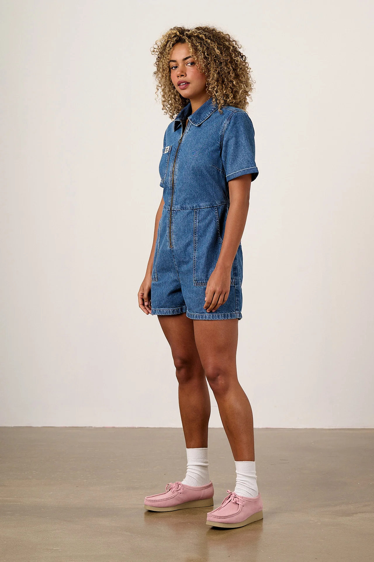 Riley - Denim Playsuit in Mid Wash Blue - Image 4